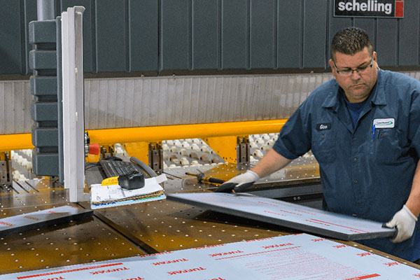 Service Member cutting plastic material 